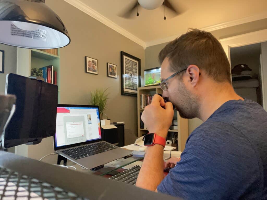 Justin at his desk